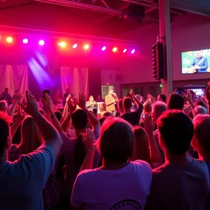 Community members cheer for local musicians at an event in Bowling Green.