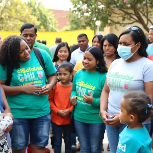 Community members participating in a child abuse awareness event in Bowling Green