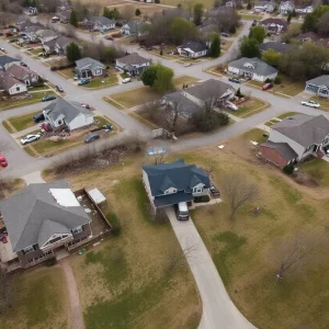 Aerial view of tornado damage in Kentucky with volunteers aiding recovery efforts